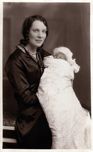 After my baptism, being held by my father's lovely niece, Margaret Gordon